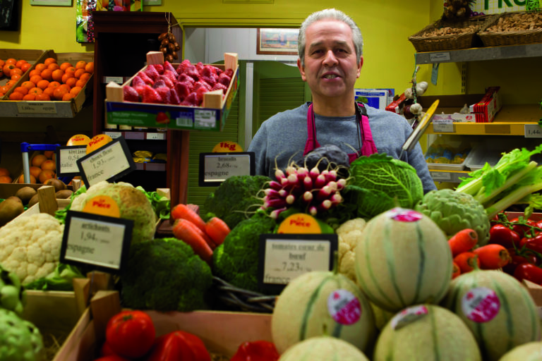 Photo d'un vendeur de légumes